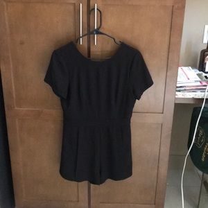 Low-back black romper size medium